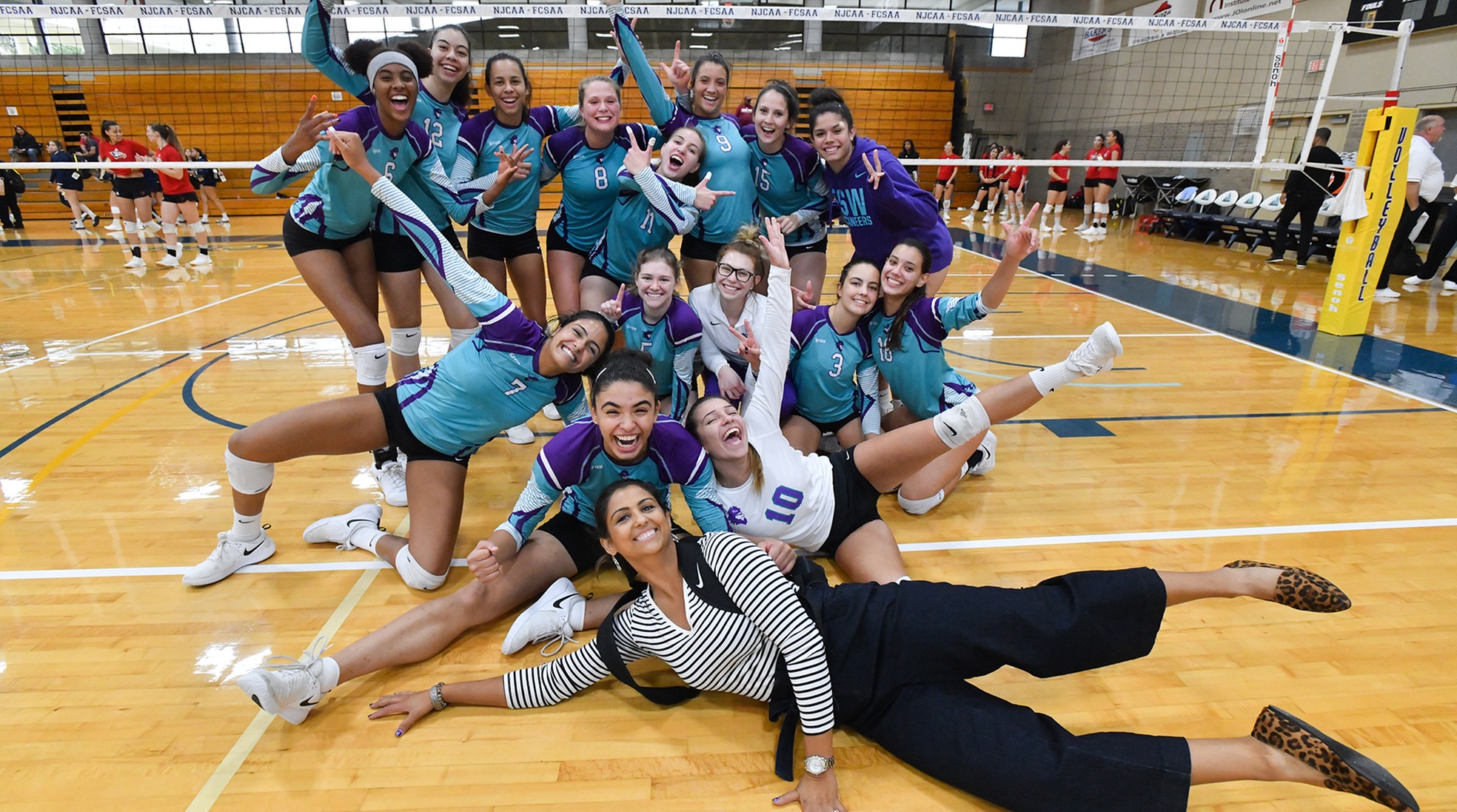 FSW celebrates their win over #14 Central Florida (Photo by Tom Haggerty)