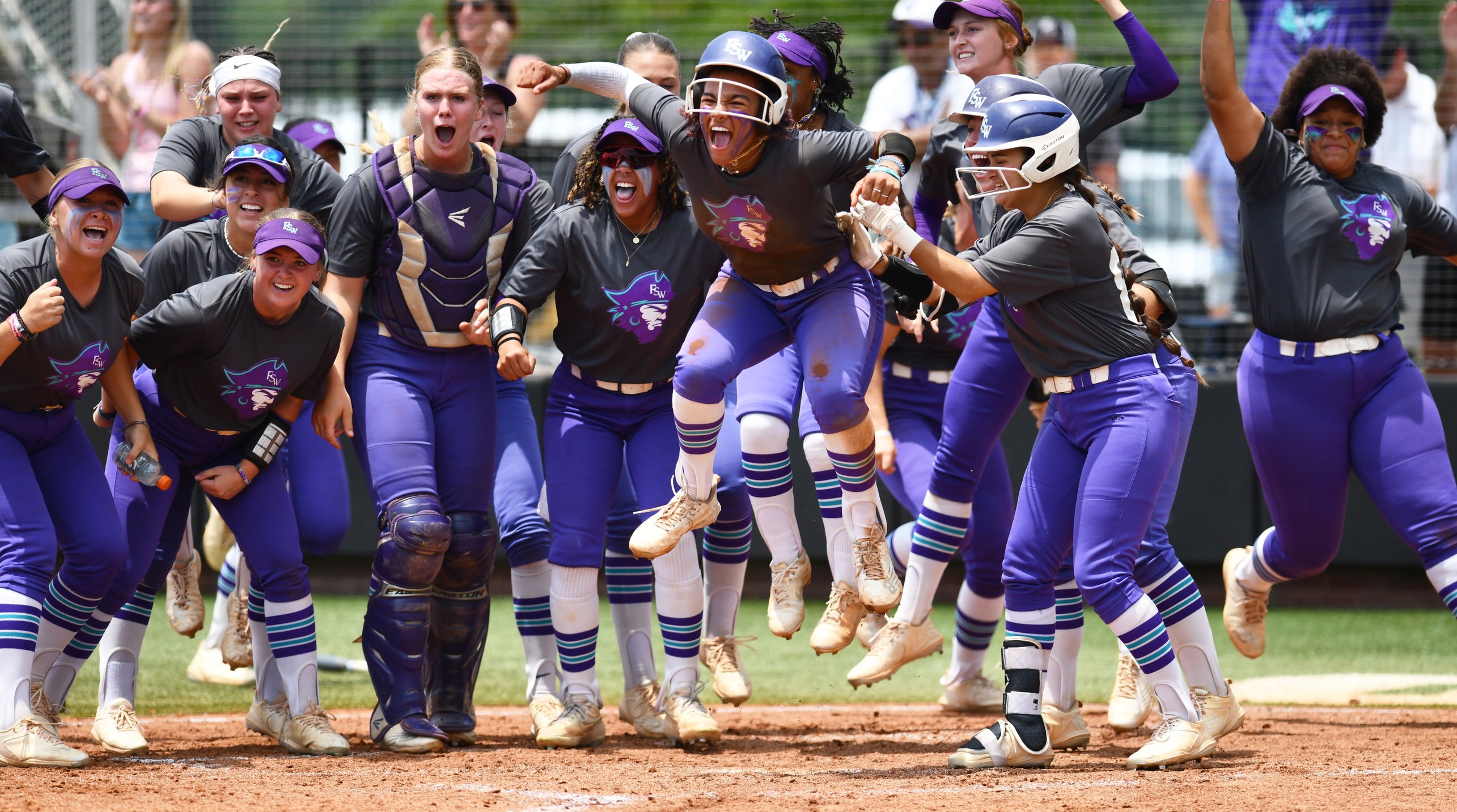 The Bucs Celebrate Feline Poot's 4th Inning Home Run (Photo by Roy Allen)