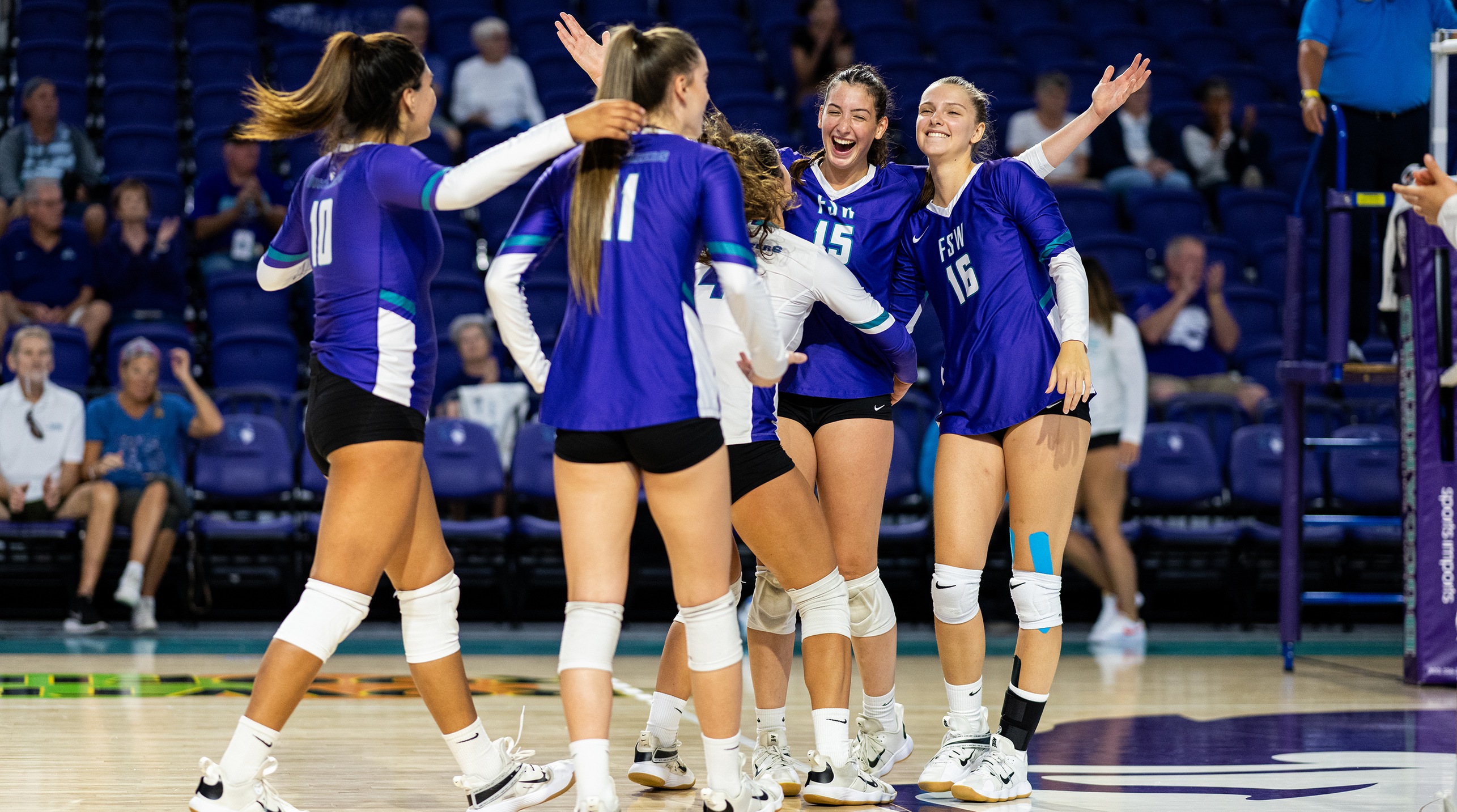 The Bucs celebrate a point in their win over Polk State Friday
(Photo by Brad Young/BradYoungPhoto.com)